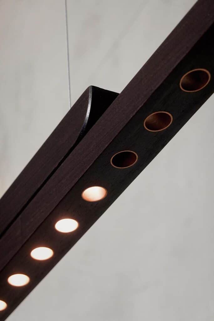 Moono sliding pendant light introduces tactile lighting design -