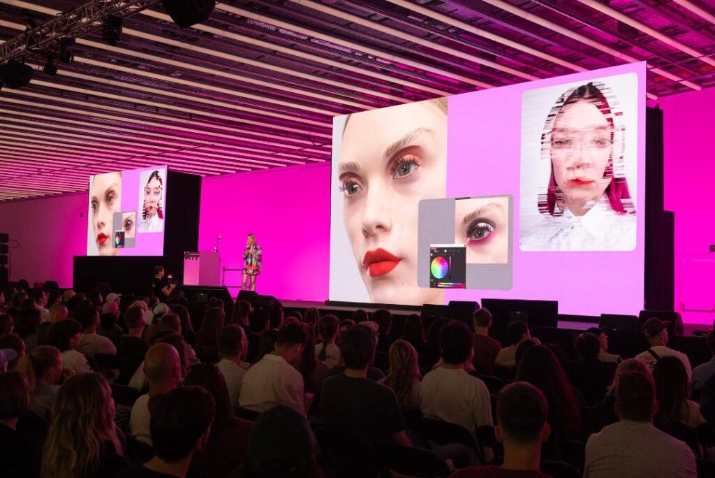 OFFF Barcelona conference stage with large audience and digital visuals