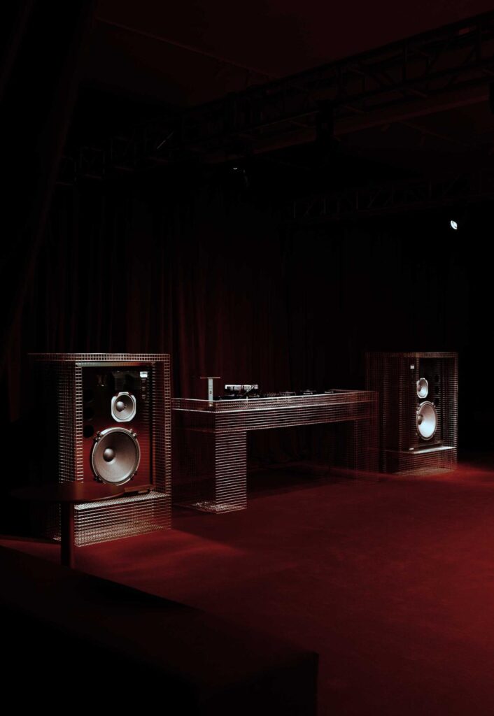 DJ booth finished in polished stainless steel surface