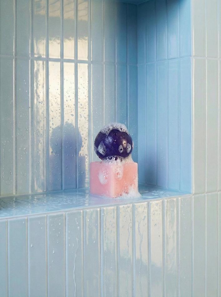 Bathroom setting showing orb soap and tray arrangement