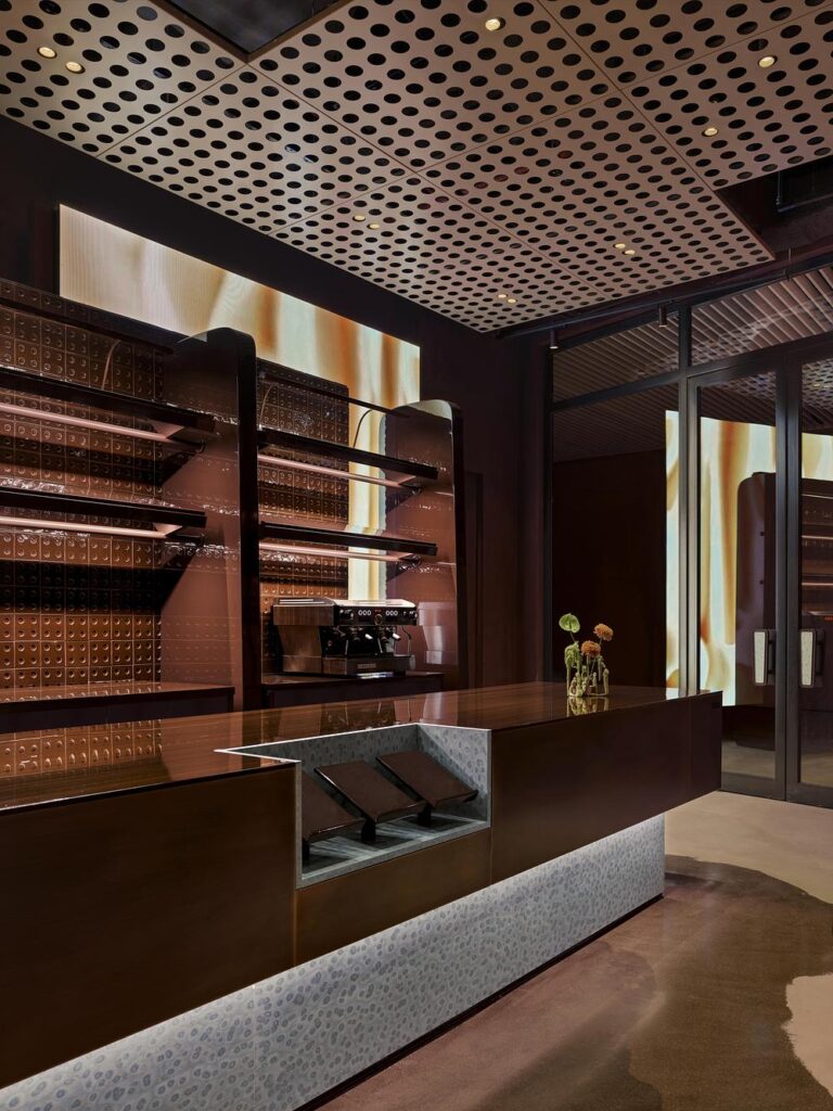 URBANJOBS structures ORIGAMI bakery through a layered spatial system -