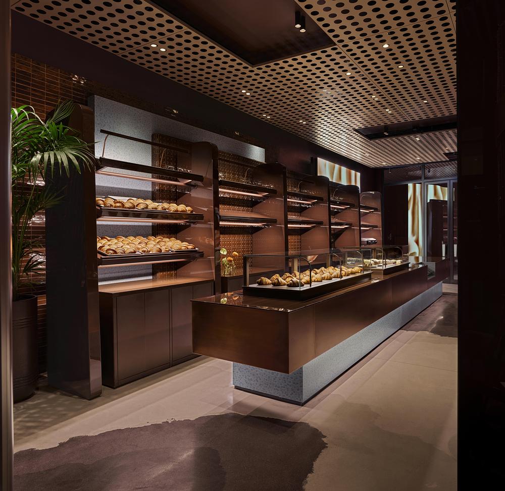 URBANJOBS structures ORIGAMI bakery through a layered spatial system -