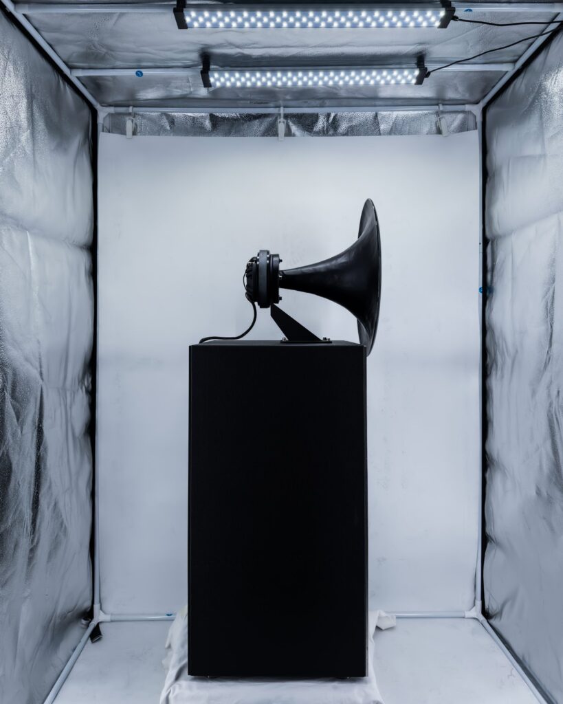 STOOM Series loudspeaker with exposed horn and structural cabinet in raw industrial finish