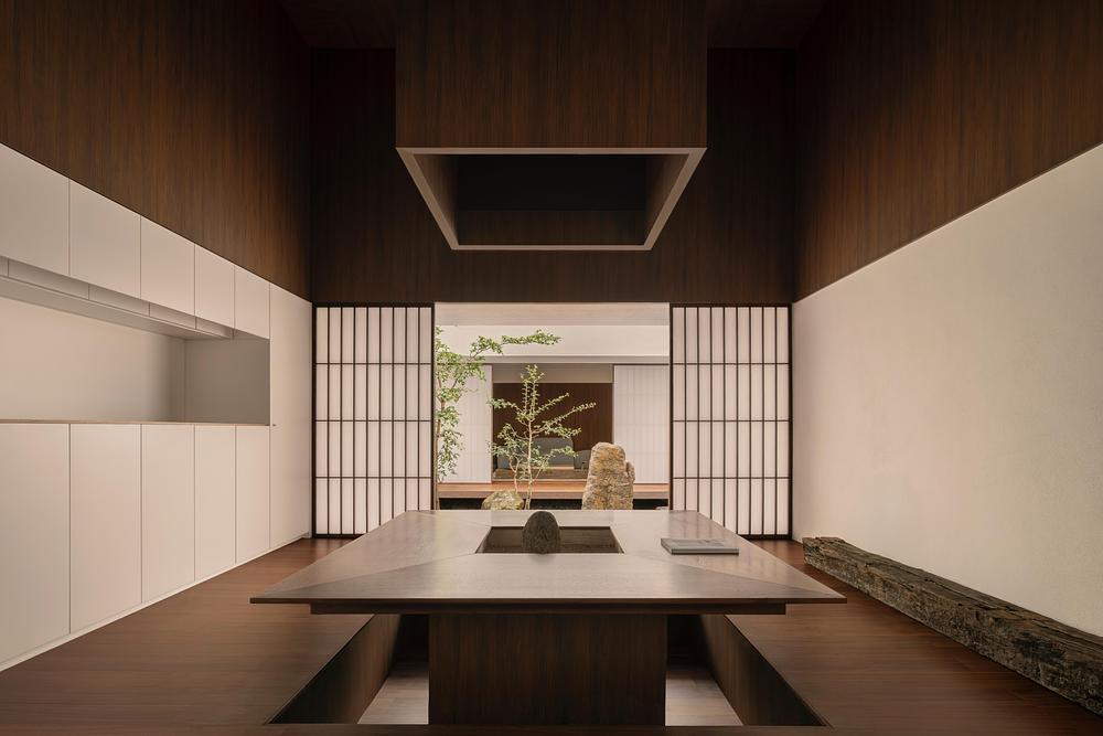 Kehai House by HW Studio built around a stone garden and central void -
