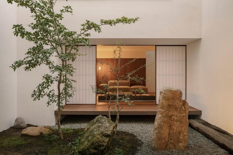 Kehai House by HW Studio built around a stone garden and central void Kehai House by HW Studio built around a stone garden and central void