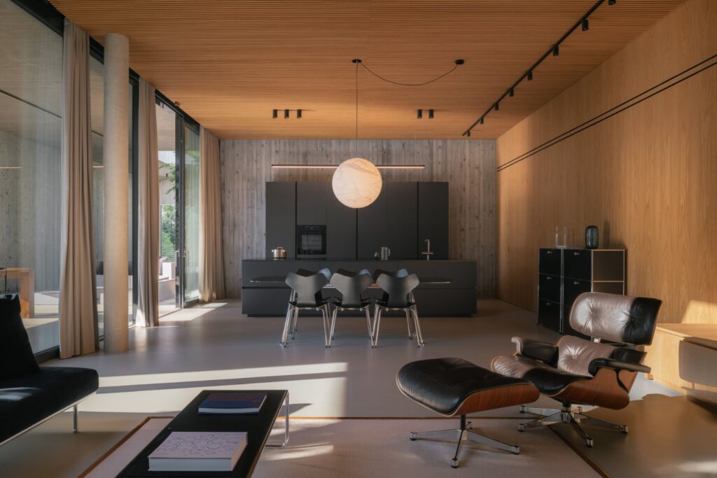 Minimal concrete villa by MIDE architetti connects architecture and landscape -