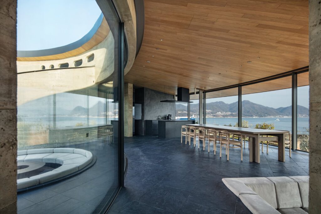 Black slate flooring and timber interiors inside the four-bedroom villa