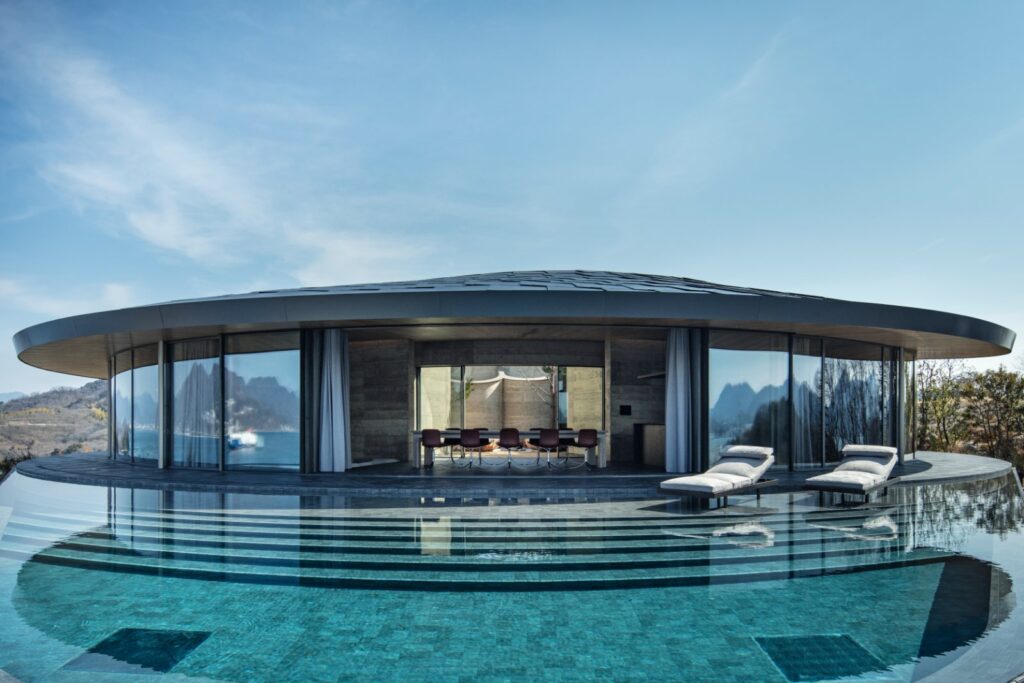 Outdoor pool and firepit terrace facing the Setouchi landscape