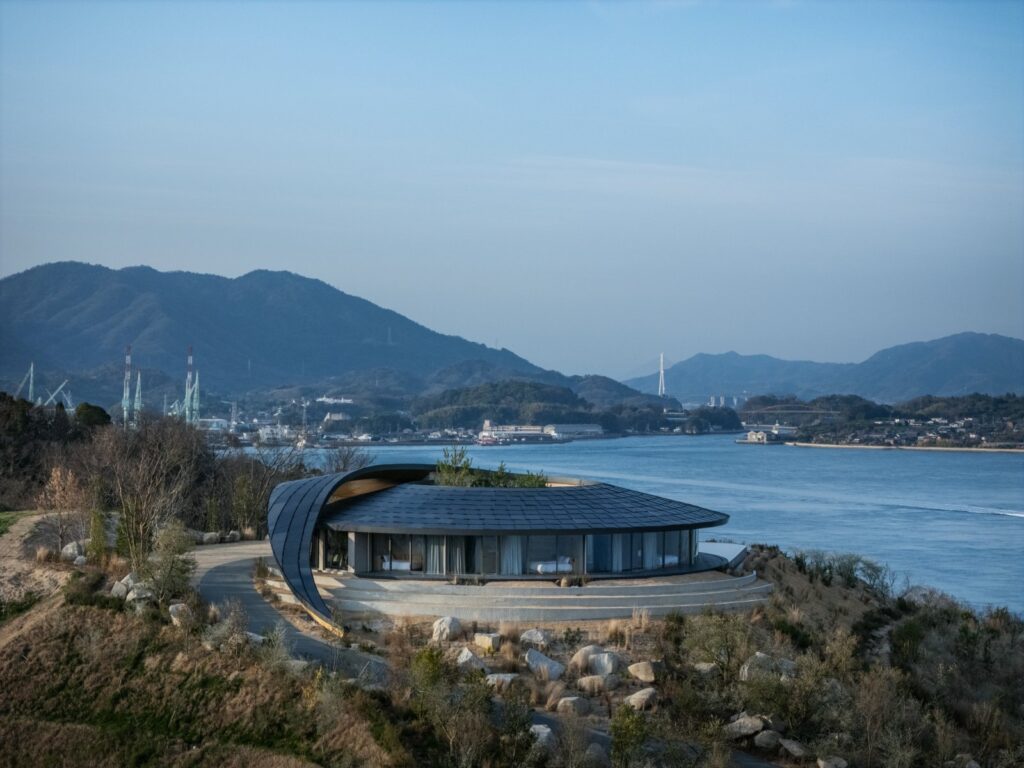 Curved roofline following the mountainous terrain of Sagishima Island