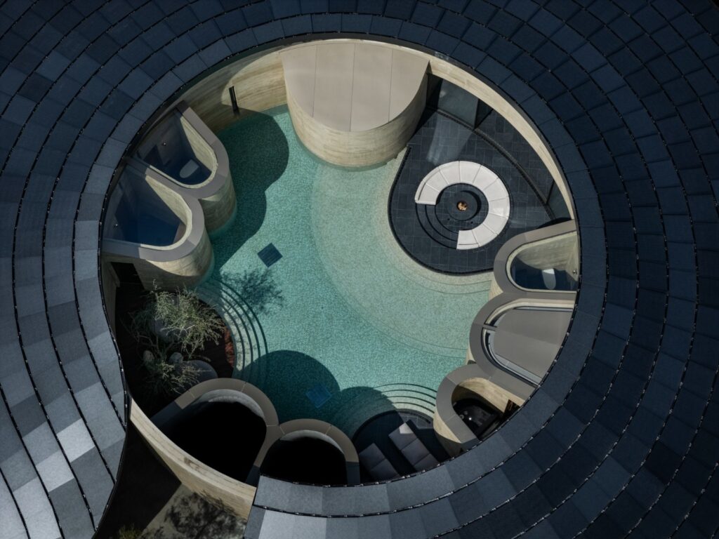 Ring-shaped villa arranged around a private courtyard with sea views