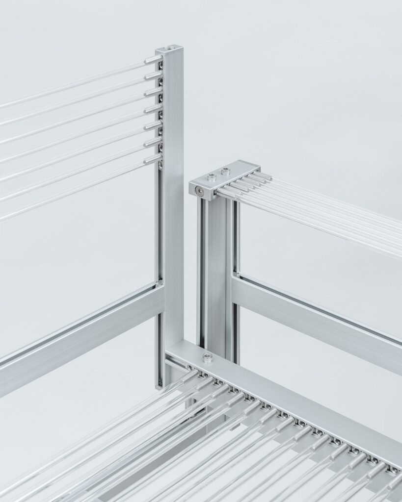 Close-up of the PU-T-B fastening system showing compression around metal hardware