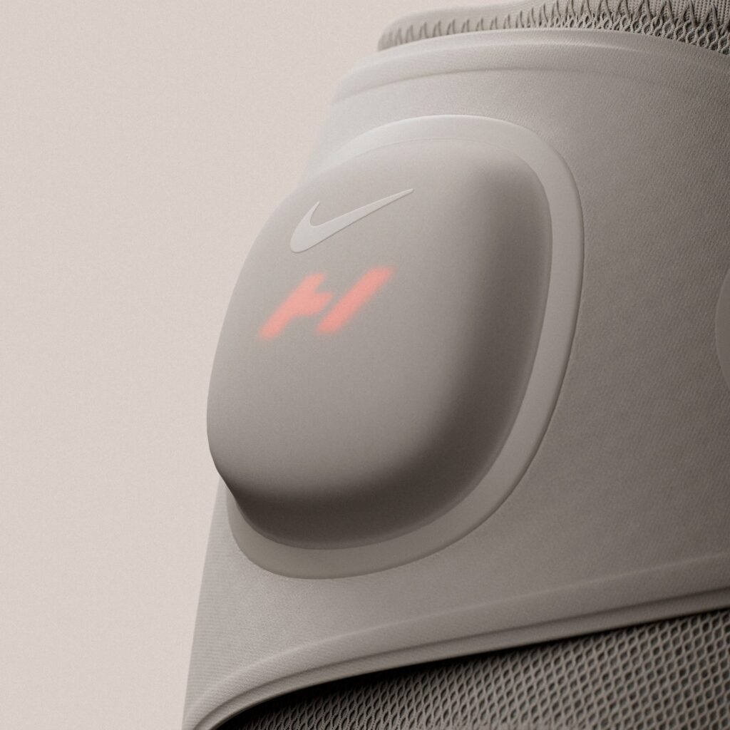 Nike and Hyperice control pod with illuminated heat and vibration indicators