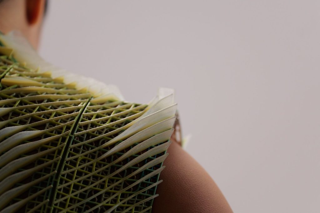 Detail of the 3D-printed lattice and flexible elements across the shoulder