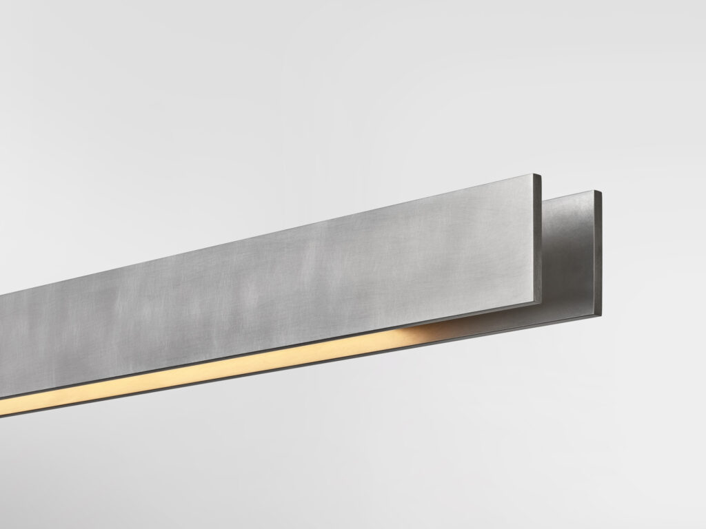 Ross Gardam designs Liminal linear pendant with uplight and downlight -