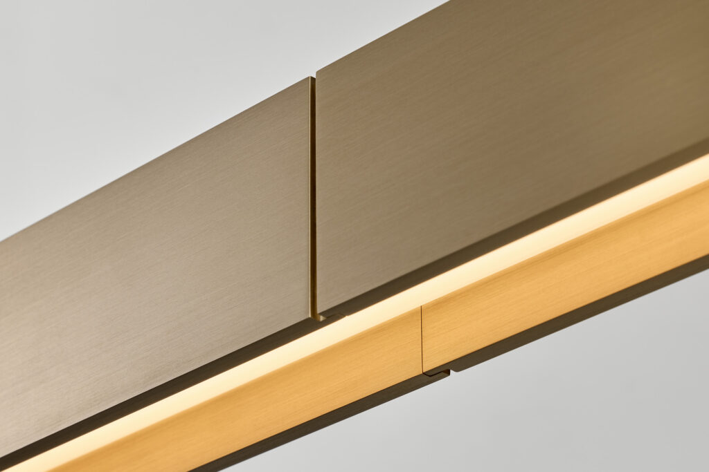 Ross Gardam designs Liminal linear pendant with uplight and downlight -
