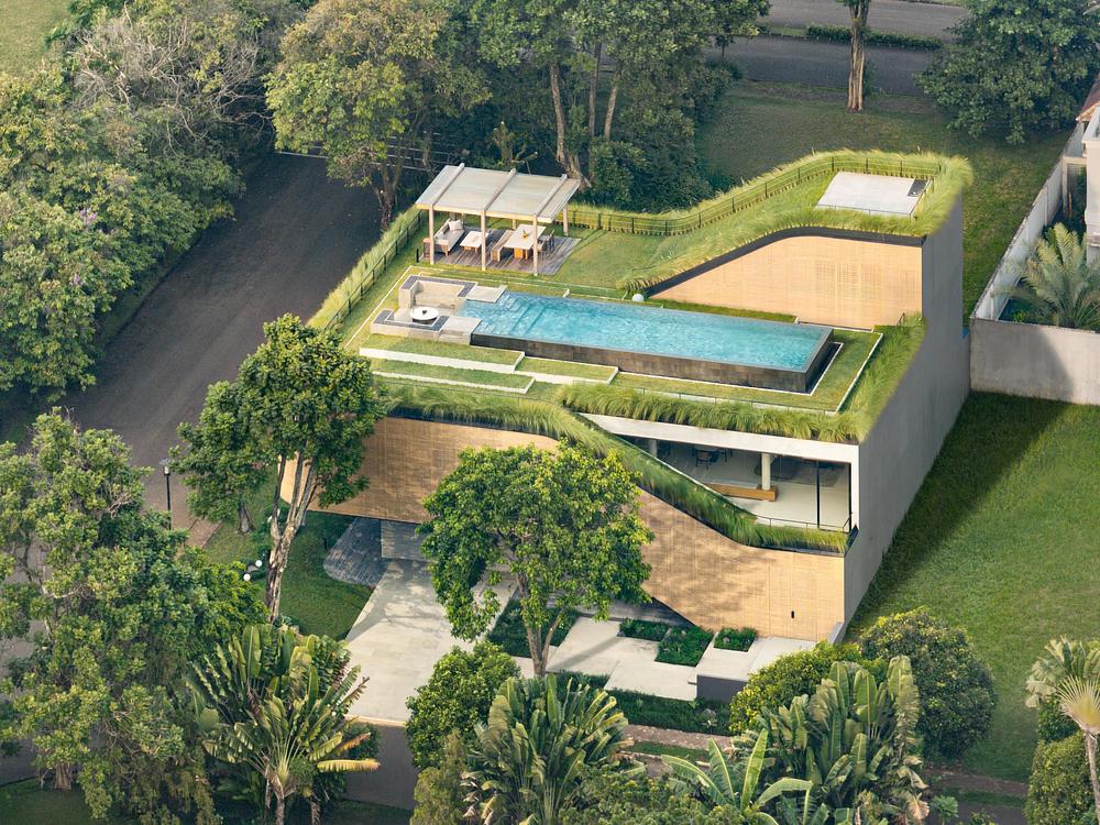 Split Mass Residence connects living spaces through grassy rooftops -