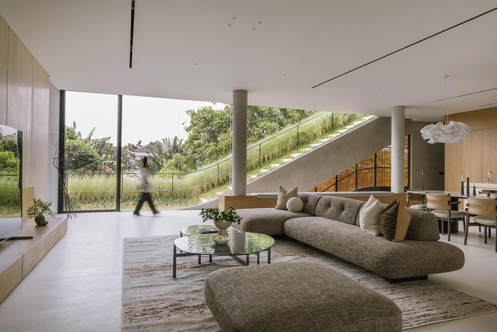 Split Mass Residence connects living spaces through grassy rooftops -