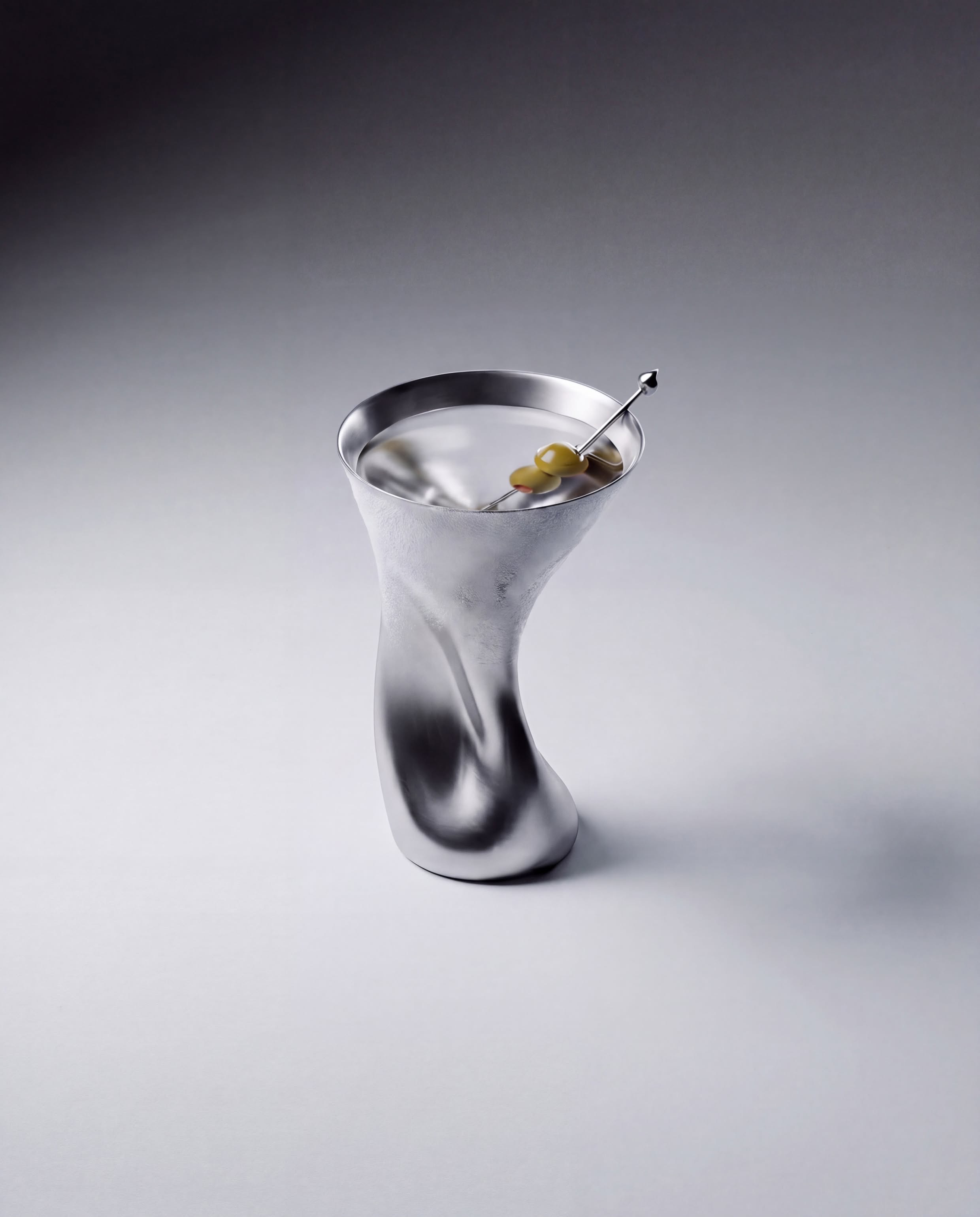 Davide Bozzo Studio reimagines Dry Martini barware through distorted steel