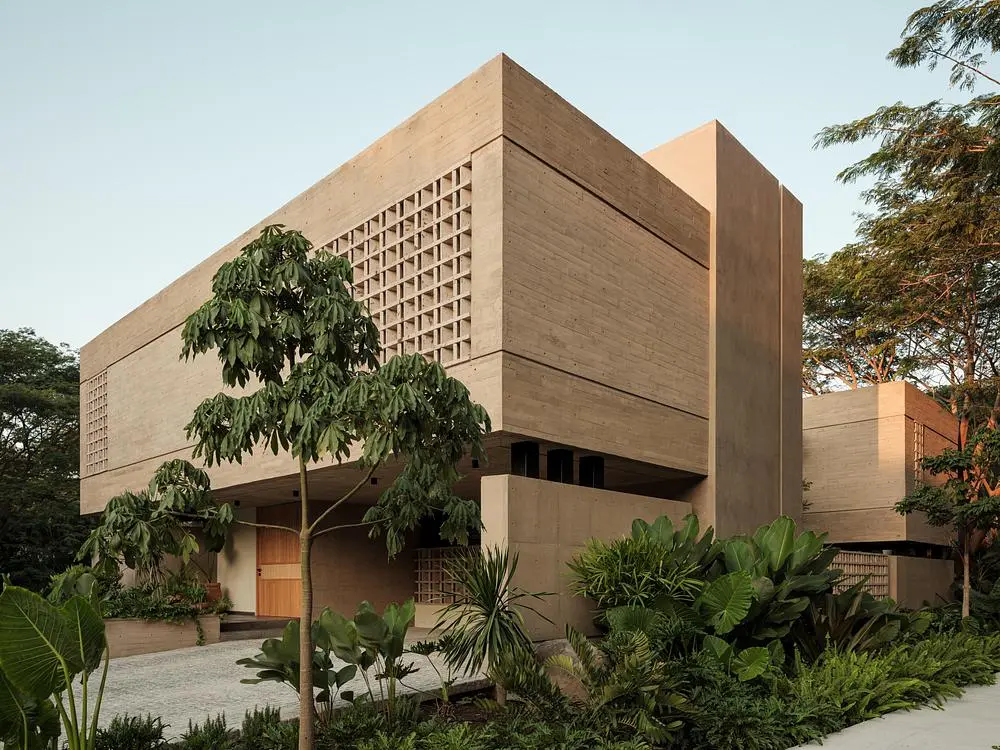 Casa Akina by Di Frenna Arquitectos filters light through concrete 1