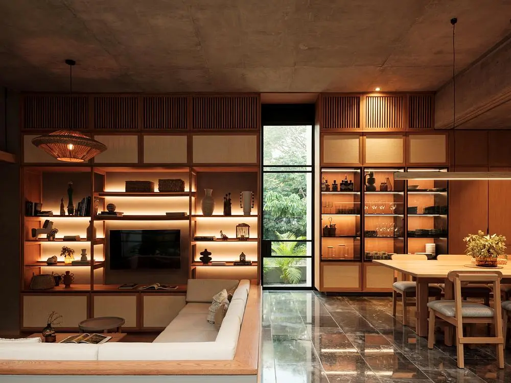 Casa Akina by Di Frenna Arquitectos filters light through concrete 5