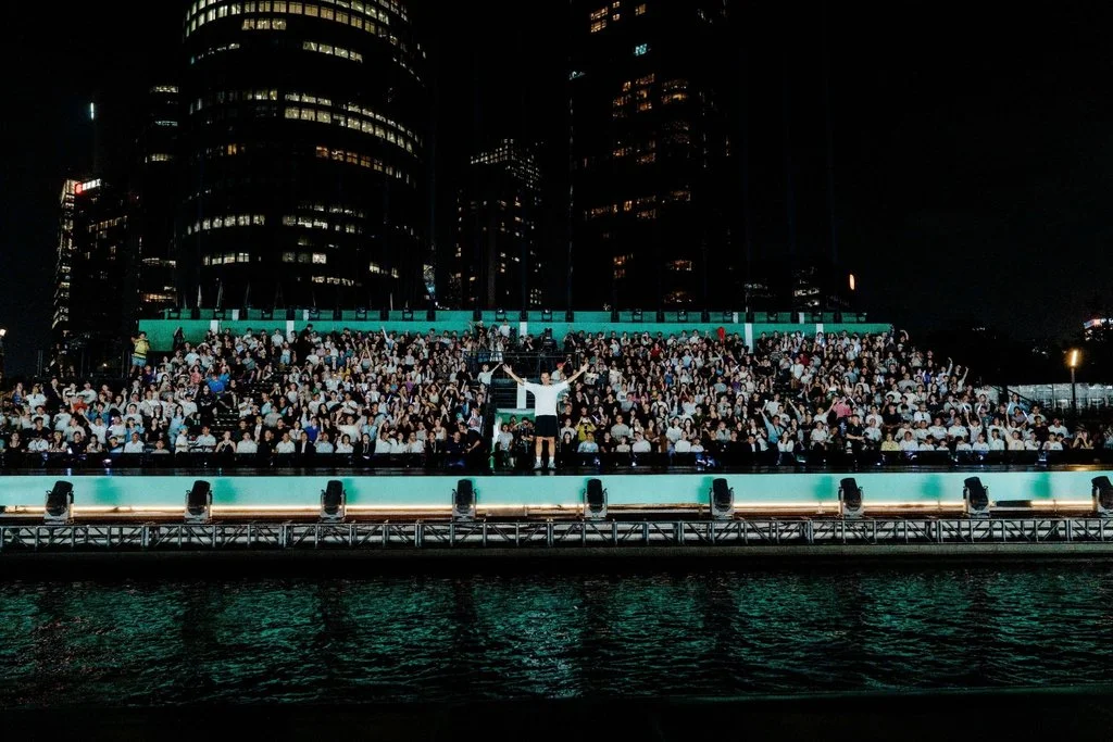 Roger Federer greets a large crowd of spectators at On Thanks for Playing tennis event in Shenzhen