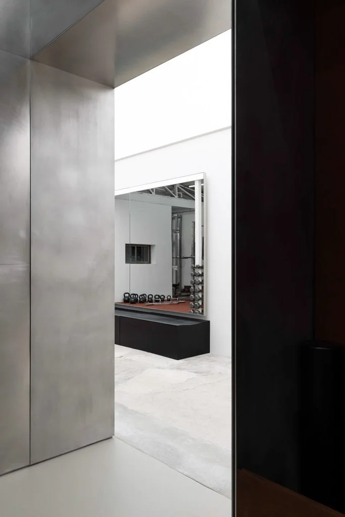 Creative Studio Unravel designs industrial UVU workout space in Seoul 3